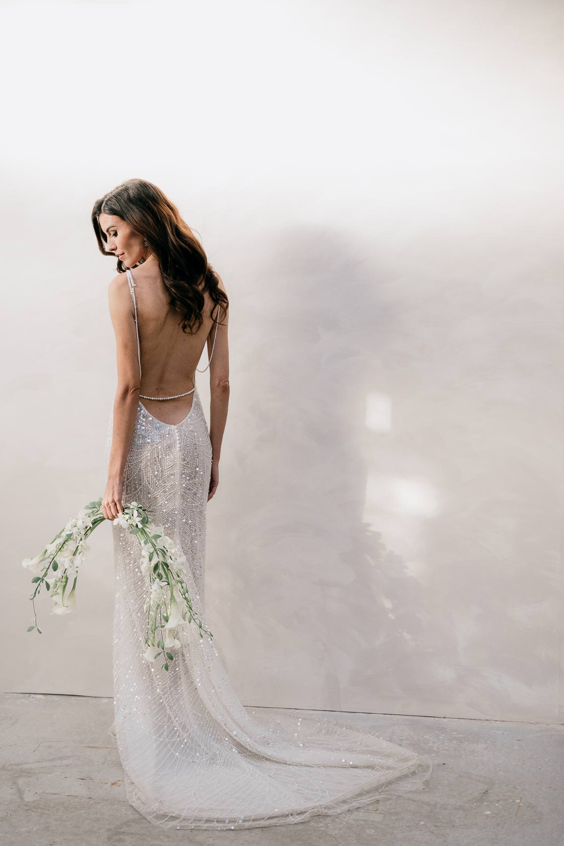 Editorial-style bridal portrait captured in soft, natural light.