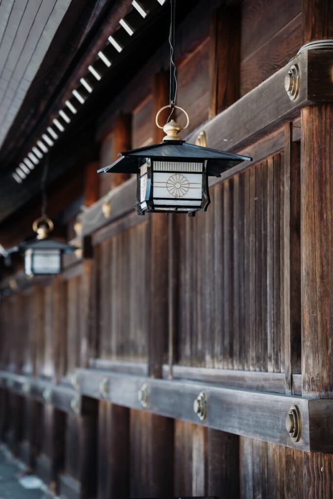 Wooden lantern on the exterior of a Shinto shrine in Hokkaido before the wedding ceremony.