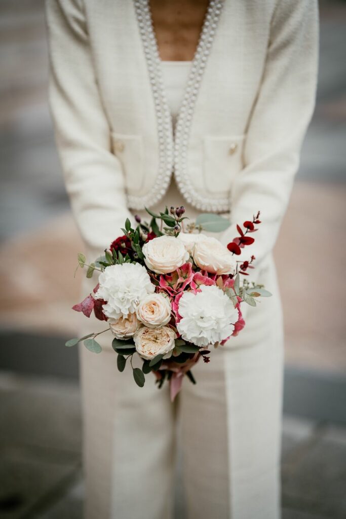 Bride holding her bouquet during a city hall wedding near Paris