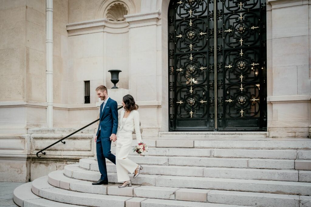 Bride and groom leaving the city hall after their wedding near Paris